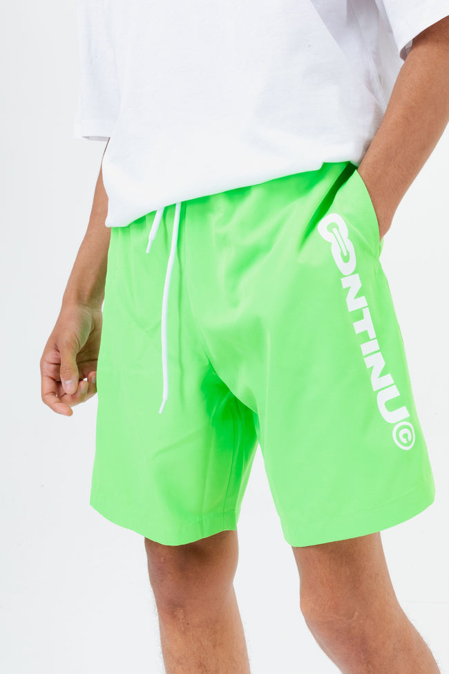 CONTINU8 YELLOW SWIM SHORTS