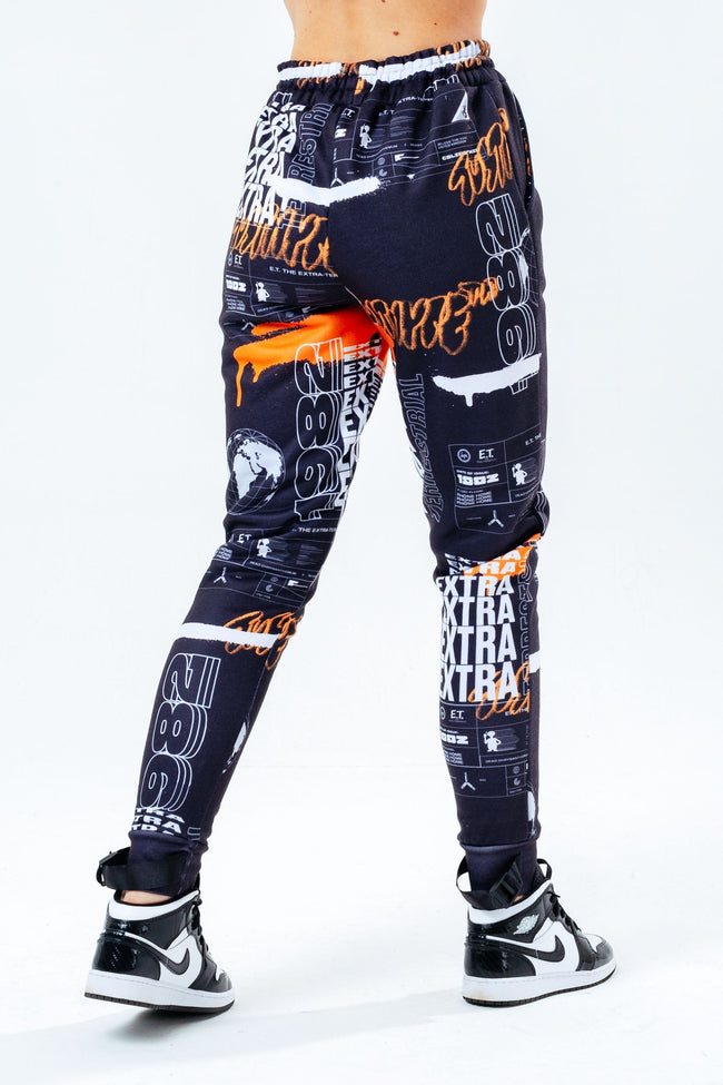 HYPE X E.T ORANGE AND BLACK REPEAT LOGO PRINT ADULT JOGGERS