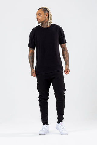 HYPE BLACK TONAL TAPE SCRIBBLE LOGO MEN'S OVERSIZED T-SHIRT