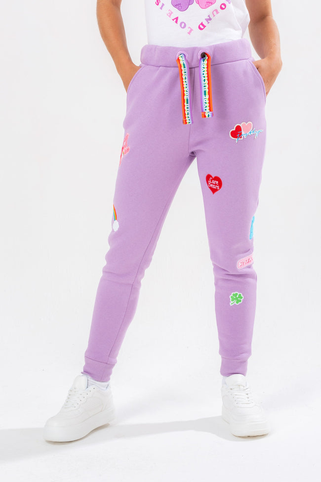 HYPE X CARE BEARS WOMENS LILAC EMBROIDERED SCRIBBLE JOGGERS