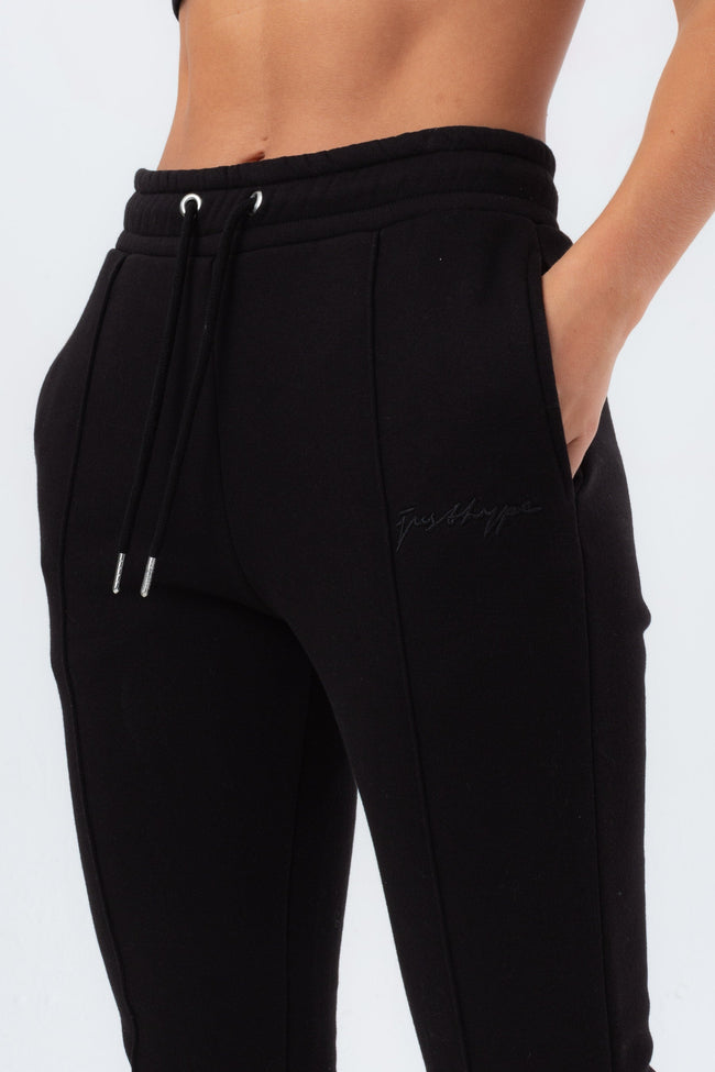 HYPE WOMENS BLACK EXPOSED OVERLOCK JUSTHYPE JOGGERS